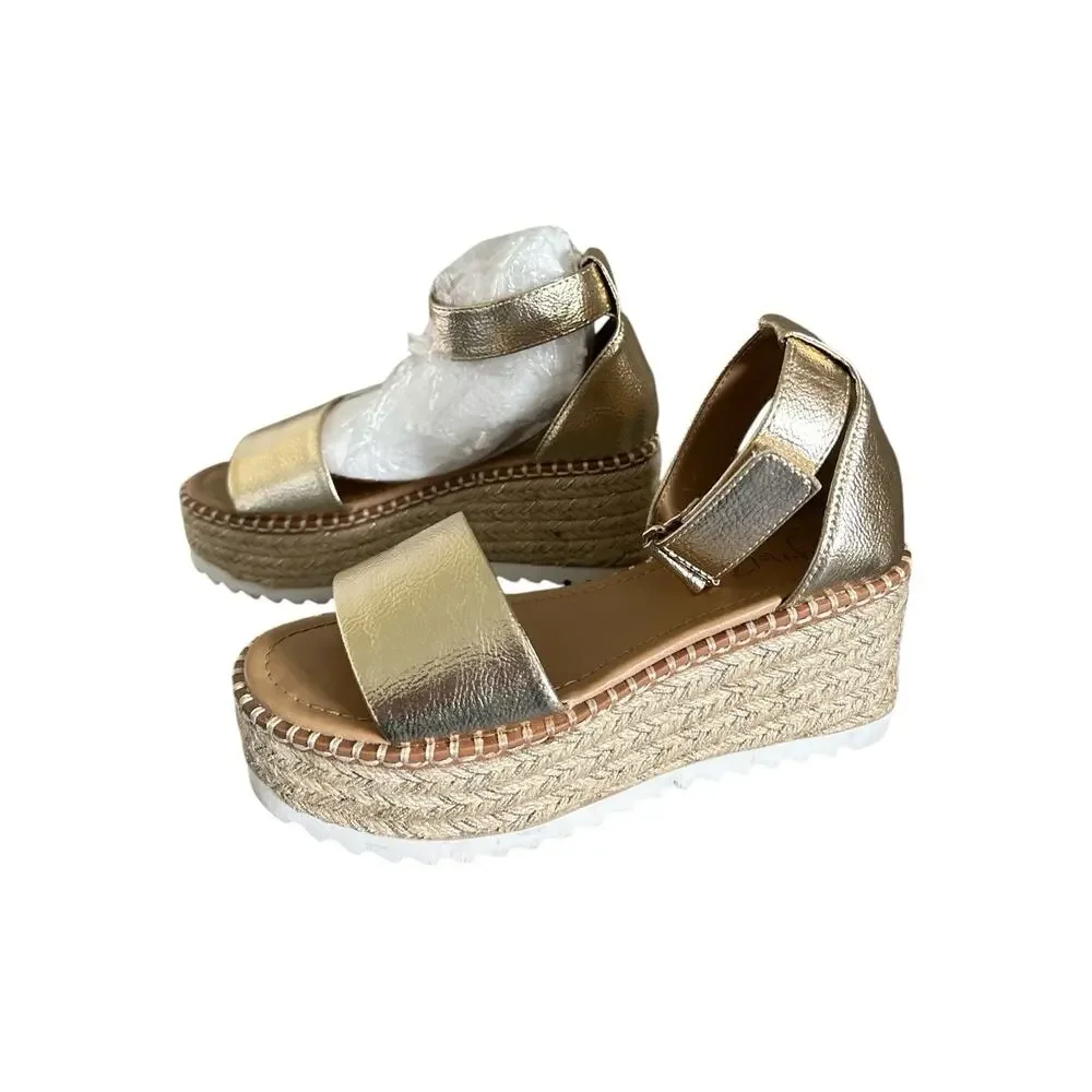 Y-Not Tuckin Platform Wedges in a metallic light gold finish.Size 6.5